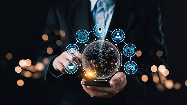 istock A business professional interacts with a glowing digital globe and AI powered network icons, symbolizing digital market planning, strategic AI integration, and effective management solutions. 2230137114
