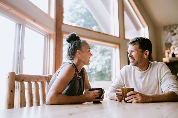 istock Mature Couple Relaxing at Home with Coffee 2230139307
