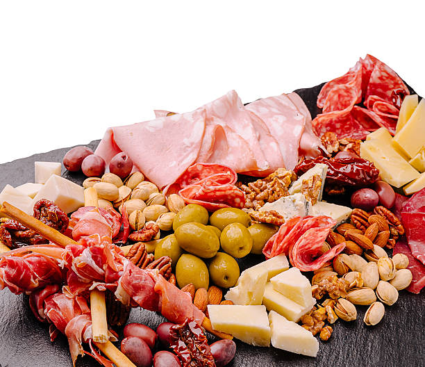 istock Delightful assorted charcuterie platter with cheeses and nuts for sharing 2230140434