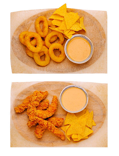 istock Crispy fried snack platter featuring onion or squid rings and shrimp strips with dip 2230140623