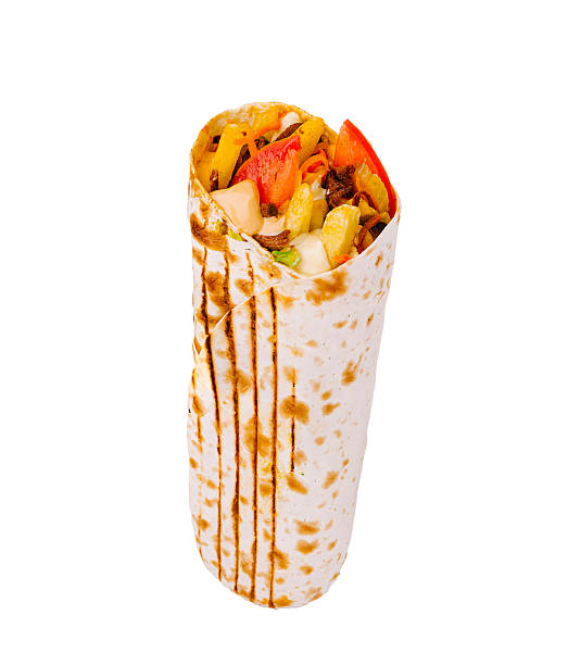istock Delicious wrap filled with fresh vegetables and savory meat for a quick meal 2230141367