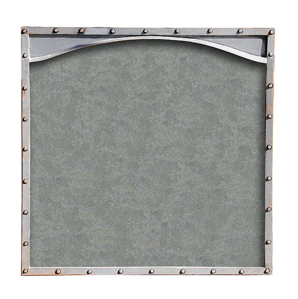 istock Metallic retro square frame with vintage rivets. Isolated on white background. Can be used for steampunk, mechanical design and industrial aesthetics. Vintage-inspired metal frame 2230145284