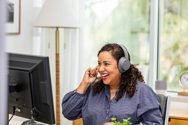 istock Happy Hispanic Woman using Computer in Office Video Call 2230145846