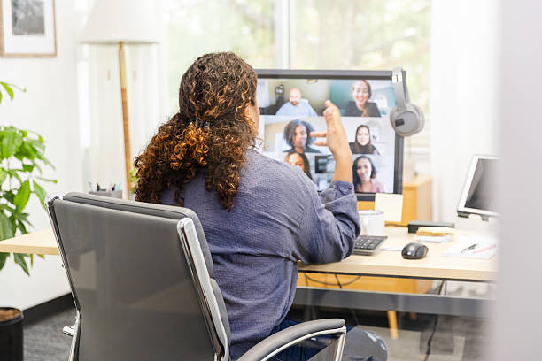istock Remote Team Meeting: Diverse Women in Virtual Video Conference 2230145932