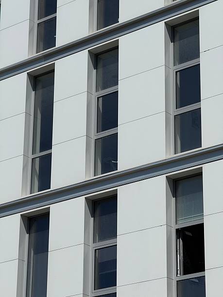 istock Close-Up of Modern Building Facade with Vertical Window Design 2230146698