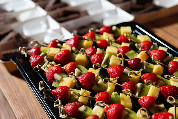 Fresh fruit and dessert skewers display