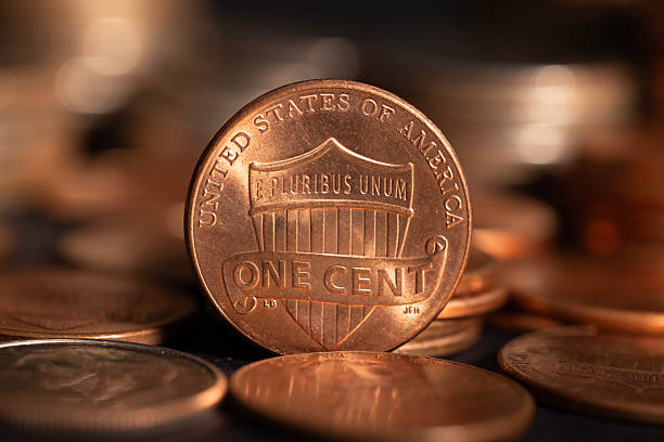 istock A stack of dollar coins stacked on each other in different positions. Money 2230152343