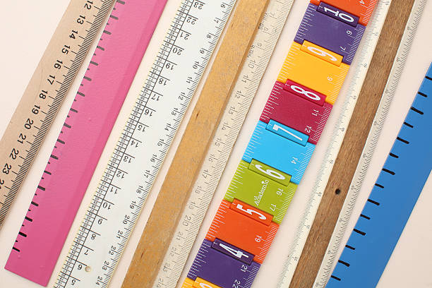 Stationery calculator ruler calculator and school stuff on coloured background. Concept of school and college learning. High quality photo