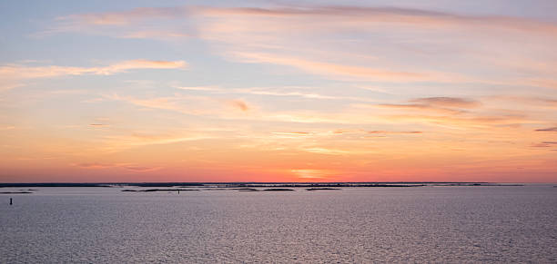 Bright sunset over the sea and islands.