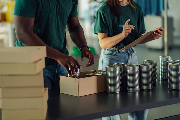 istock Volunteers preparing food donations for people in need 2230159419
