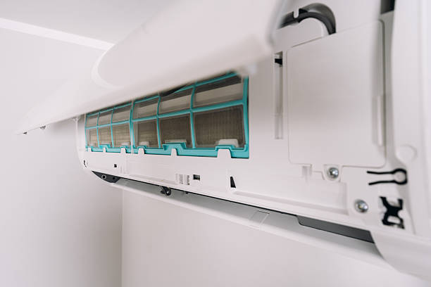istock Seasonal maintenance on an conditioning unit in a modern apartment. 2230160953