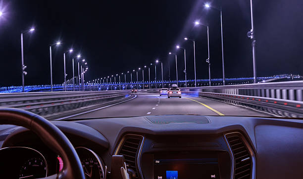 istock View from the car on the illuminated highway at night 2230163959