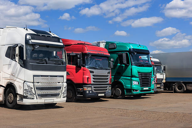 istock Large trucks parked during the day 2230163969