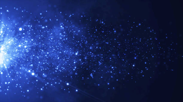 istock Elegant defocused blue dust particles over dark background with glow rays. Event game trailer titles 2230166516