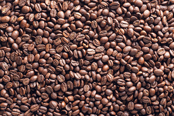 istock Top View of Aromatic Roasted Coffee Beans Background 2230171535