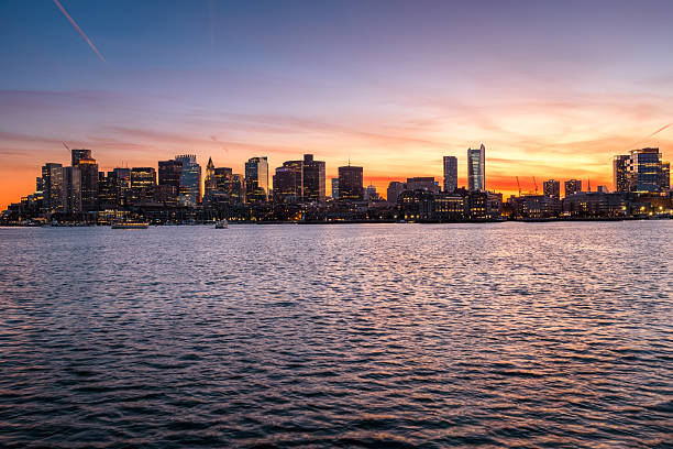 istock View of Boston downtown skyline under dramatic sky at sunset in autumn 2230173714