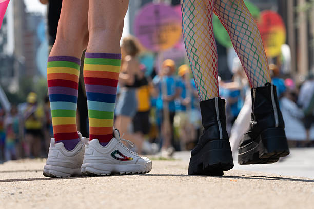 istock Two people during an LGBTQ+ parade 2230175814