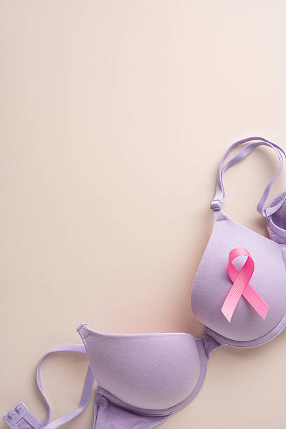 istock Lavender vertical bra featuring a pink awareness ribbon, representing support for breast cancer awareness and prevention 2230179526