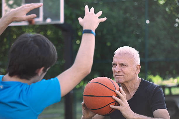 istock Family basketball training outdoors 2230180452