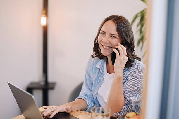 istock Woman Working from Home in a Tiny House – Minimal, Focused Workspace 2230185378