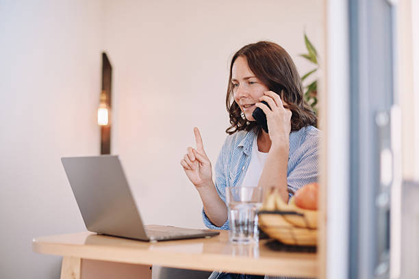 istock Woman Working from Home in a Tiny House – Minimal, Focused Workspace 2230186796