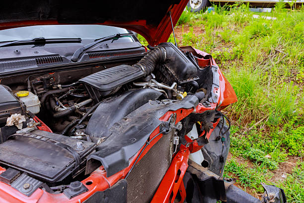 Car accident crash, Car accident protection, Claim collision, Auto emergency. Crashed car claim insurance. Warranty policy service. Serious problems. A red car with a damaged front end.