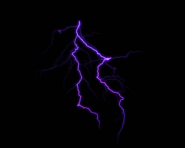 istock A vibrant purple lightning bolt flashes dramatically against a deep black background, showcasing raw electrical power and light. 2230193224