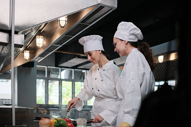 istock Two White female chefs are cooking in the restaurant kitchen together. 2230202594