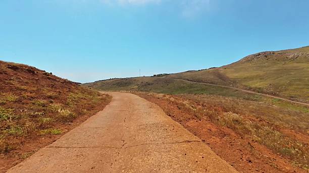 istock Experience the breathtaking beauty of a serene mountain pathway during daytime hours 2230210897