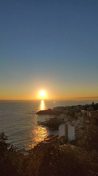 istock Golden Sunrise Over a Coastal Village 2230213046