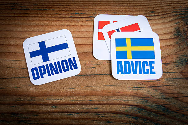 istock National flags and communication concepts on wooden background 2230213120