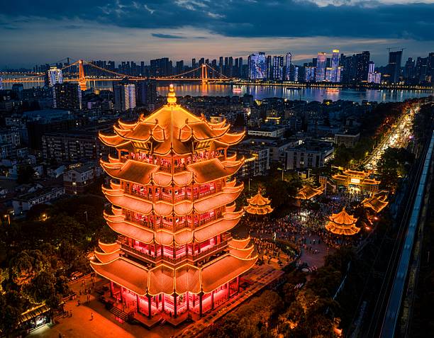 istock Illuminated Yellow Crane Tower at Night 2230224131