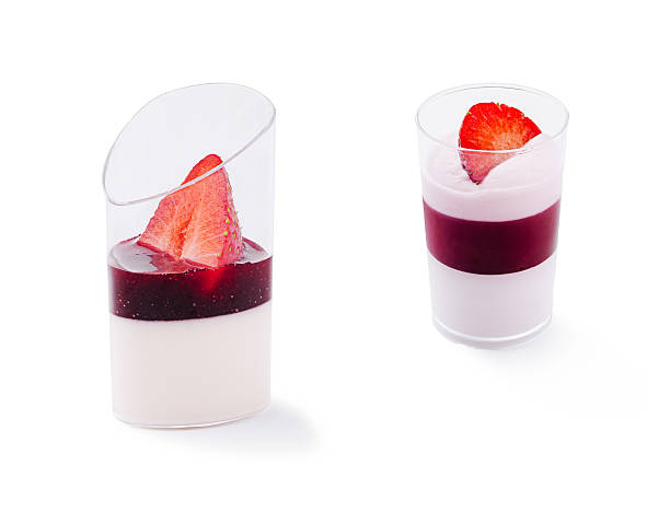 istock Delicious layered desserts with fresh strawberries and fruit sauce 2230229141