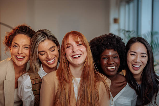 istock Five smiling businesswomen in their office 2230232020