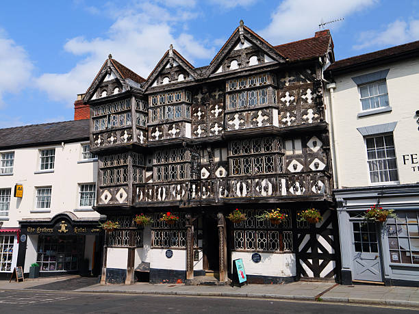 Ludlow, UK - Aug 09 2025: Timber-framed facade of The Feathers, 17th???century pub and hotel on Ludlow High Street, Shropshire, England, shot on a bright summer afternoon.