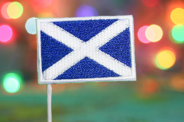 istock Vibrant bokeh backdrop with Scottish flag patch, holiday celebration theme. 2230236120