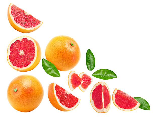 istock grapefruit with slices and green leaves isolated on white background top view. clipping path 2230237018