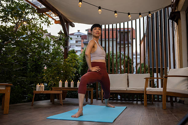istock Japanese woman stretching at balcony 2230237362