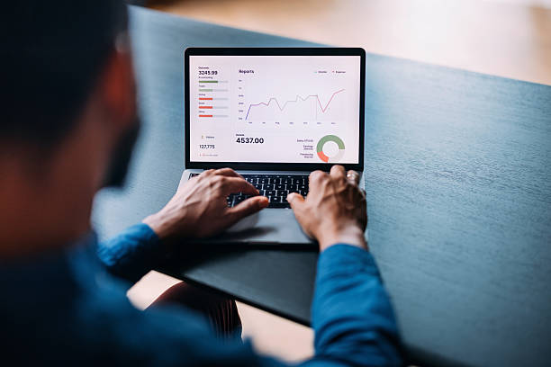 istock Business Analysis on Laptop Showing Financial Growth and Analytics Graphs 2230239865