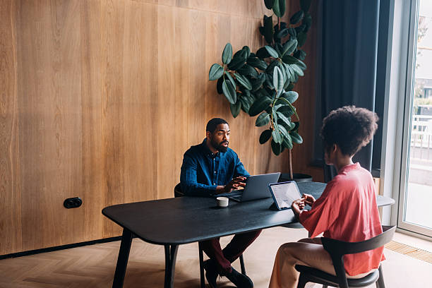 istock Diverse Team Collaborating During a Business Meeting in a Modern Office Setting 2230239874