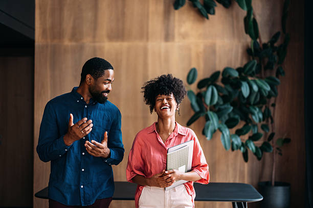 istock Coworkers Sharing a Laughter in a Modern Office Setting 2230239905