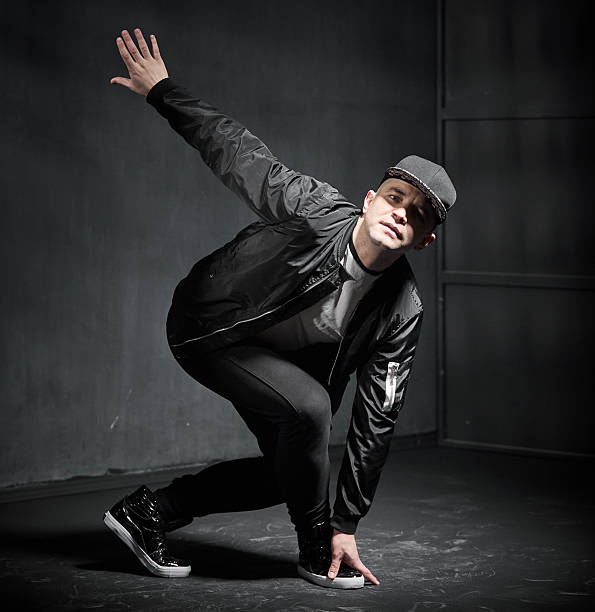 istock Attractive Young Man Performer Is Dansing Hip Hop 2230242774
