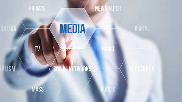istock Businessman ponting Media with his finger on a touch screen 2230244392