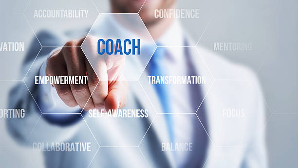 istock Businessman ponting Coach with his finger on a touch screen 2230244404
