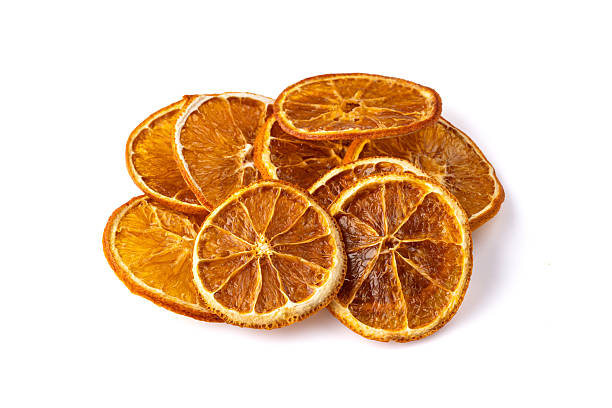 istock Dried orange slices on white background. 2230245449