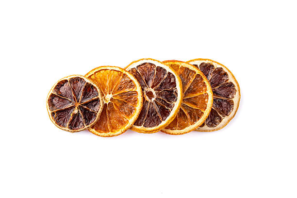 istock Dried orange slices on white background. 2230245659
