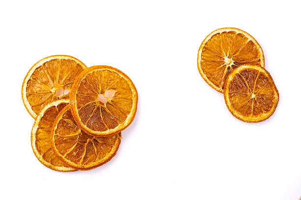 istock Dried orange slices on white background. 2230245722