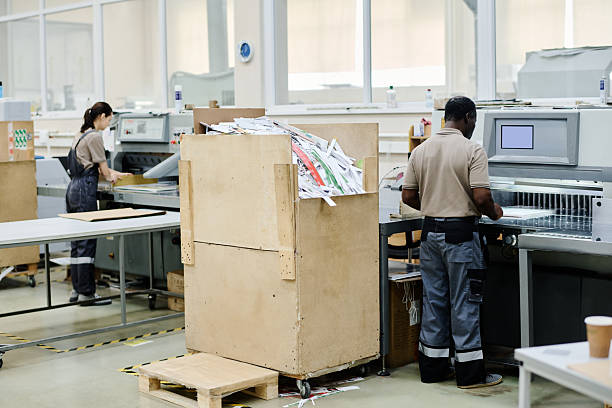 istock Man And Woman Working In Print Shop 2230247123
