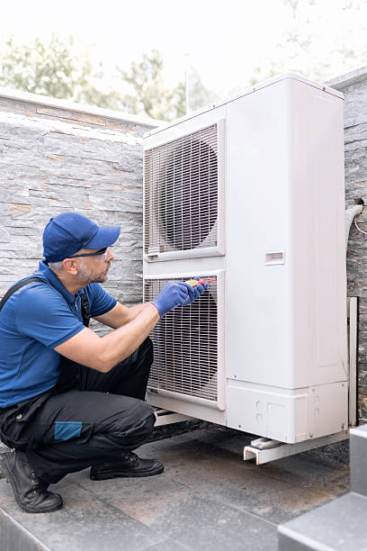 istock Repairman fixing AC outdoor unit. 2230247856