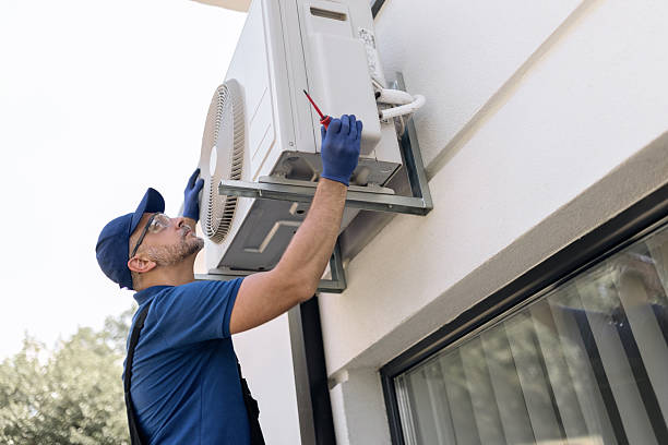 istock Repairman fixing AC outdoor unit. 2230247875